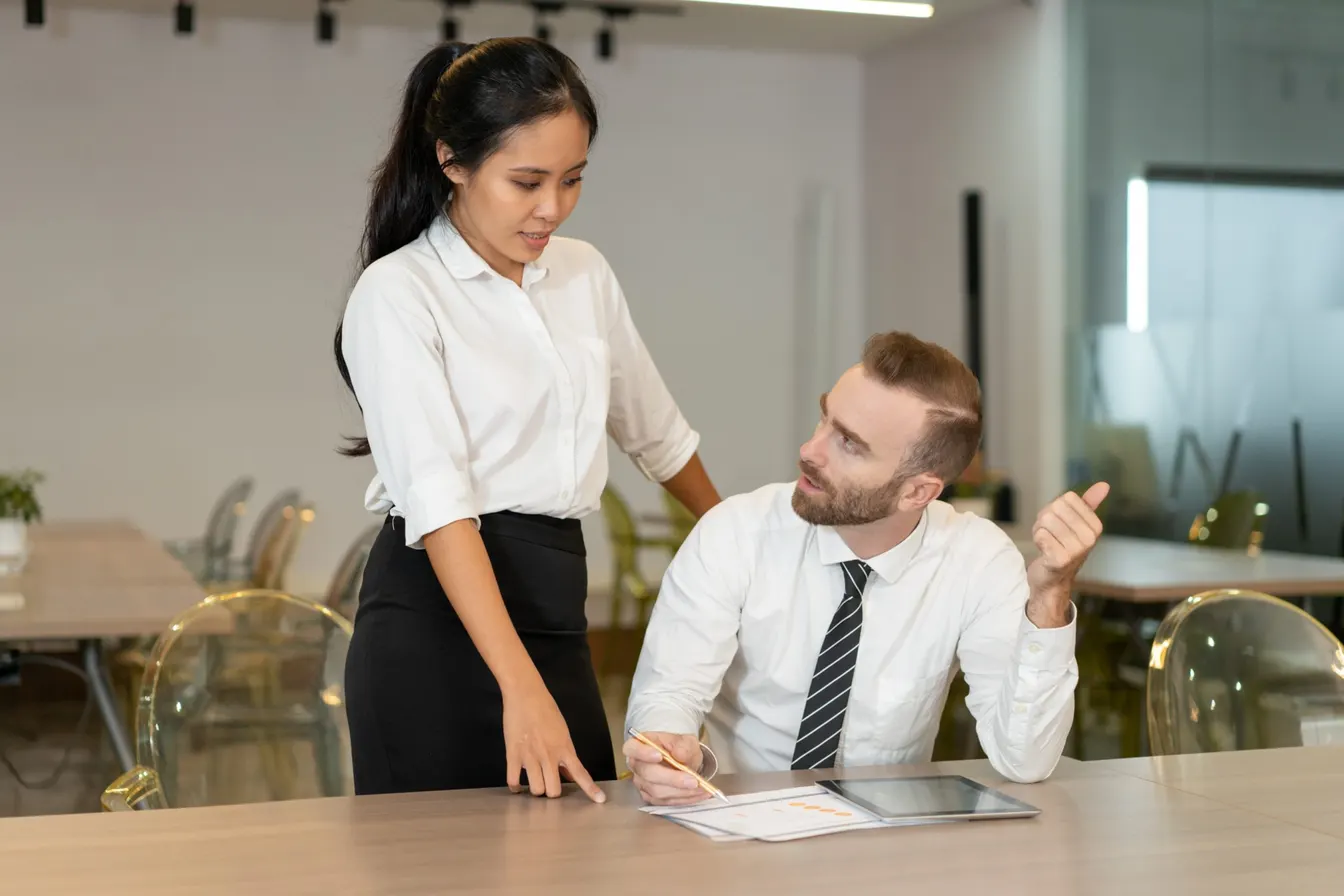 Two people having a work discussion