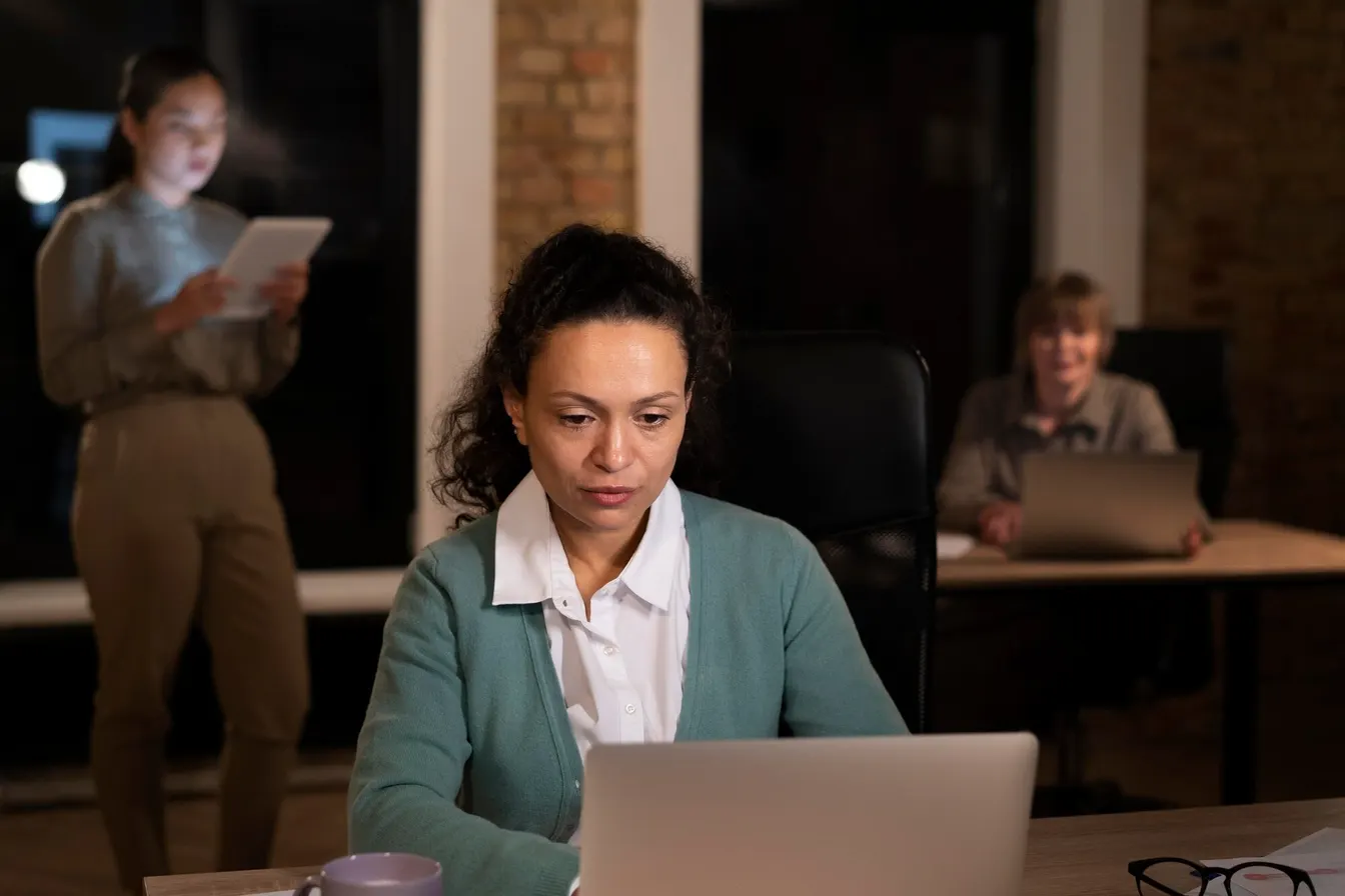 A female worker using a laptop