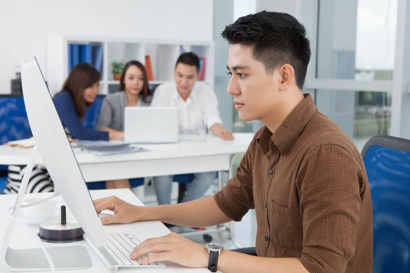 Man using a desktop computer