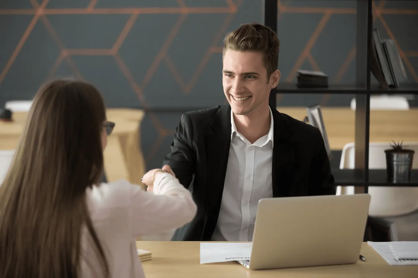 employees shaking hands