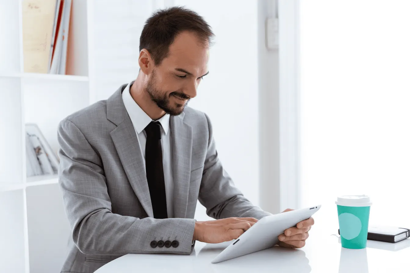 Businessman working on a tablet