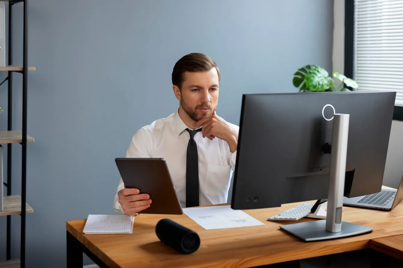 Working professional using a desktop computer